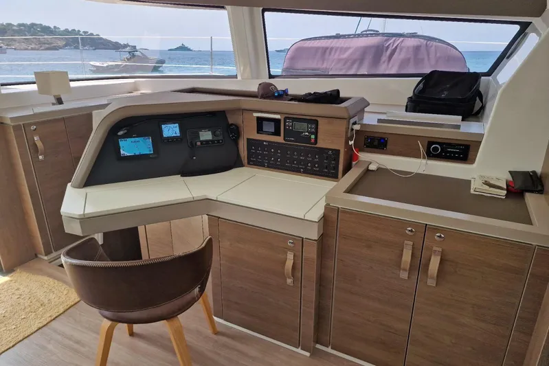 Only One Life Yacht Photos Pics Modern helm station of 2022 Bali 5.4 Open Space yacht with ocean view.