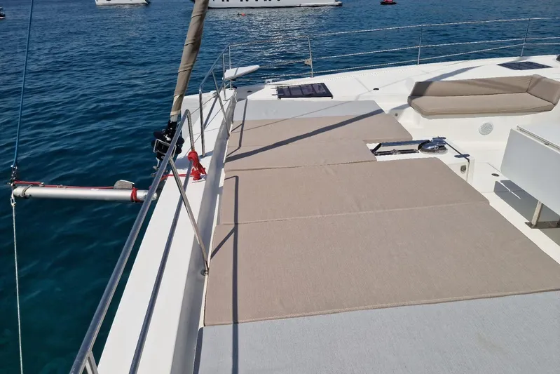 Only One Life Yacht Photos Pics 2022 Bali 5.4 Open Space yacht deck with sunbathing area on calm sea.