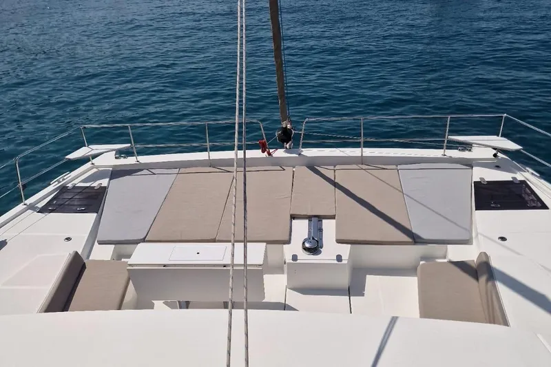 Only One Life Yacht Photos Pics 2022 Bali 5.4 Open Space catamaran with spacious deck and sunbathing area on calm sea.