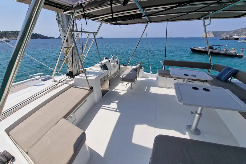 Only One Life Yacht Photos Pics Spacious deck of 2022 Bali 5.4 Open Space catamaran with ocean view.