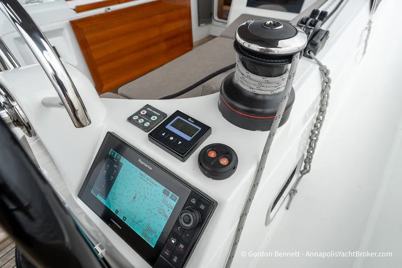 Shatzi Yacht Photos Pics Cockpit of 2022 Jeanneau Sun Odyssey 410 with navigation equipment and winch.