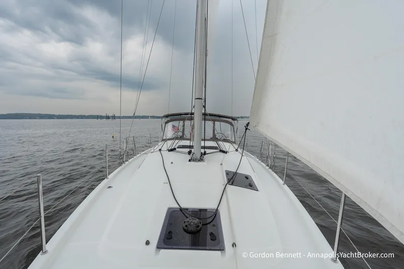 Shatzi Yacht Photos Pics Jeanneau Sun Odyssey 410 sailing on a cloudy day, 2022 model.