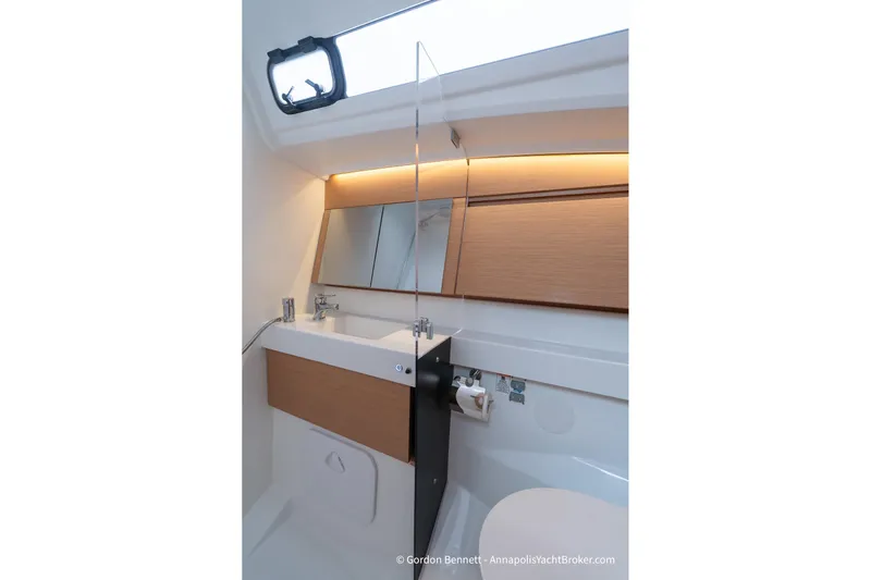 Shatzi Yacht Photos Pics Modern bathroom interior of 2022 Jeanneau Sun Odyssey 410 yacht.