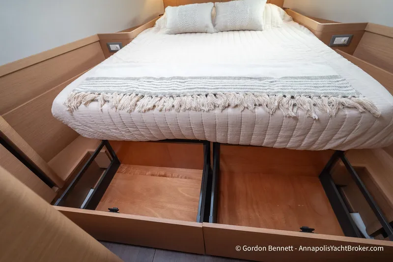 Shatzi Yacht Photos Pics Cozy cabin bed with storage in 2022 Jeanneau Sun Odyssey 410 yacht.