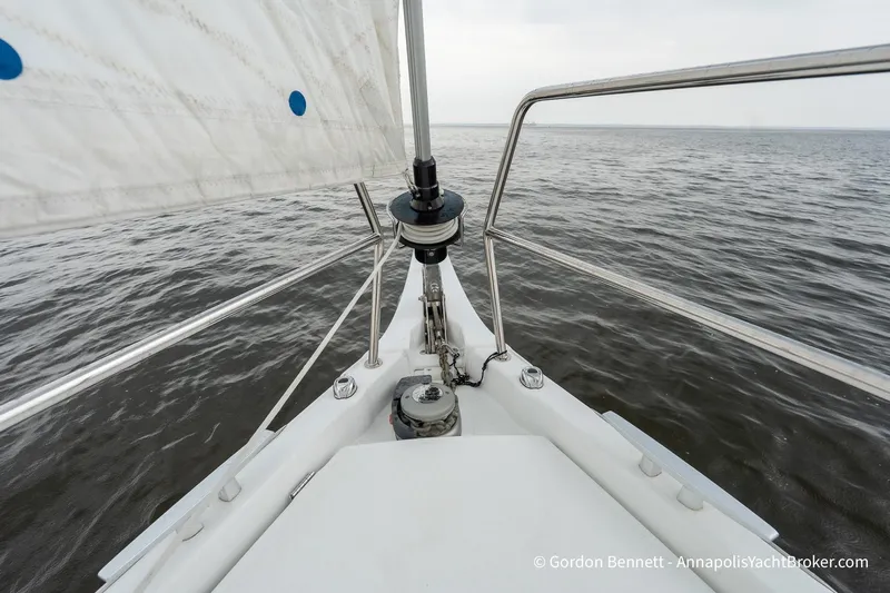 Shatzi Yacht Photos Pics Jeanneau Sun Odyssey 410 sailboat bow on open water, 2022 model.