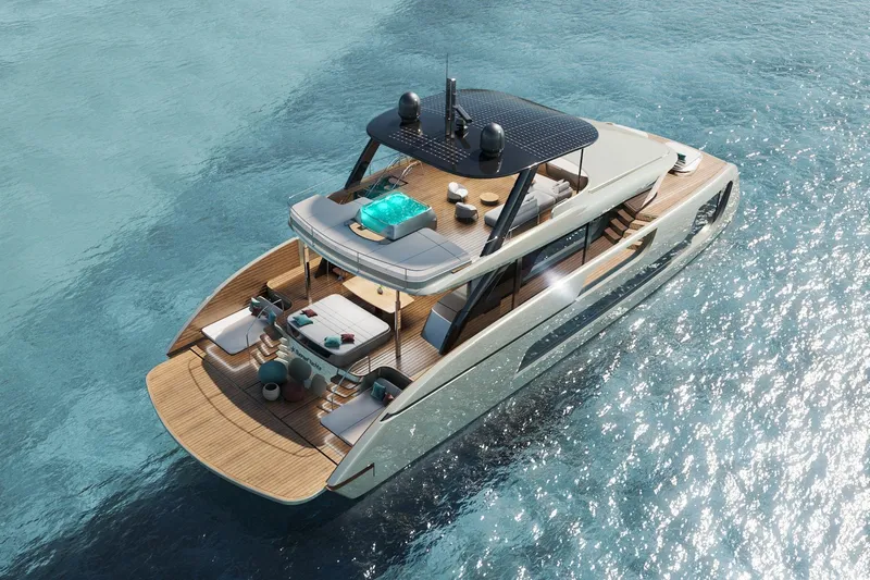  Yacht Photos Pics Luxurious 2026 Sunreef Ultima 77 yacht cruising on clear blue waters.