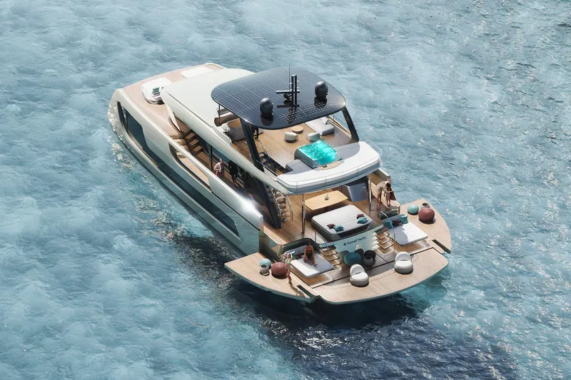  Yacht Photos Pics Luxury Sunreef Ultima 77 yacht cruising on clear blue waters, showcasing modern design and spacious decks.