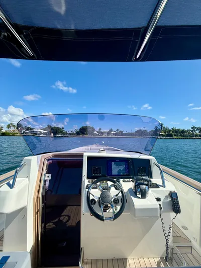  Yacht Photos Pics 2019 Fjord 36' Open yacht helm with clear blue sky and waterfront view.