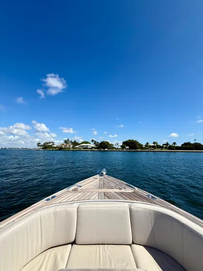  Yacht Photos Pics 2019 Fjord 36' Open boat cruising on a sunny day with clear blue skies.