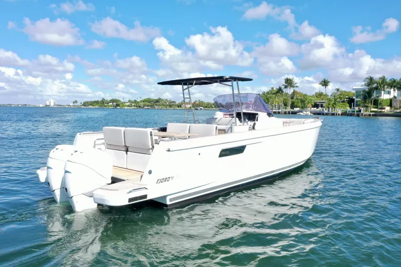  Yacht Photos Pics 2019 Fjord 36' Open boat cruising on a sunny day with clear skies.