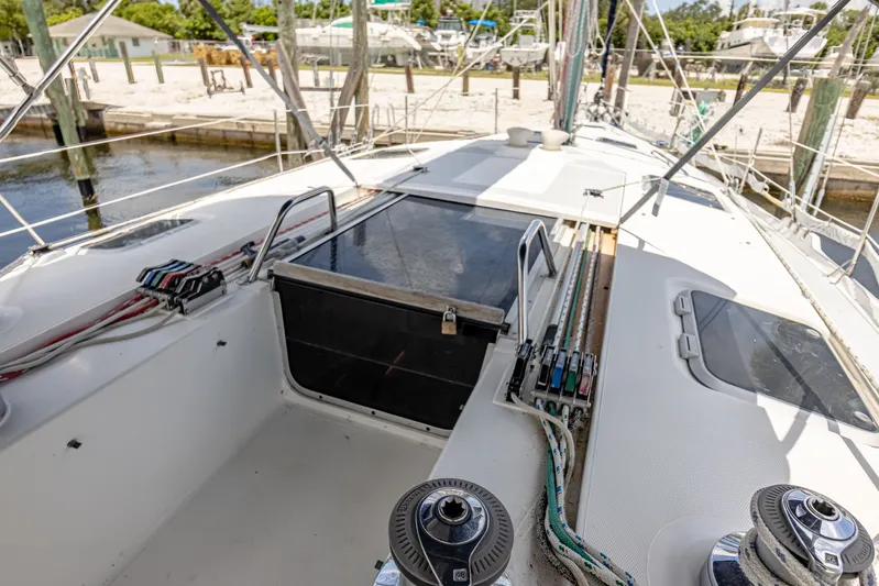 Into The Mystic Yacht Photos Pics Hunter 430 sailboat deck, 1996 model, featuring winches and rigging in a marina setting.
