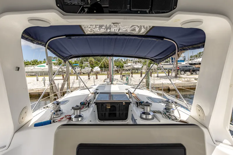 Into The Mystic Yacht Photos Pics Interior view of a 1996 Hunter 430 sailboat cockpit with blue canopy.