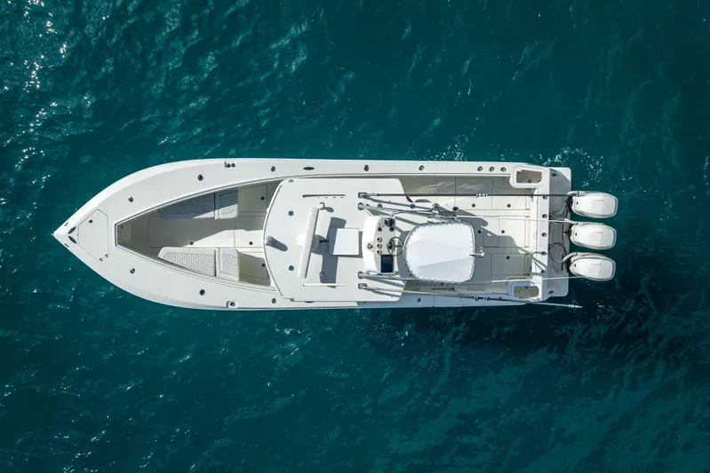  Yacht Photos Pics Aerial view of 2017 SeaVee 370Z boat on clear blue water.
