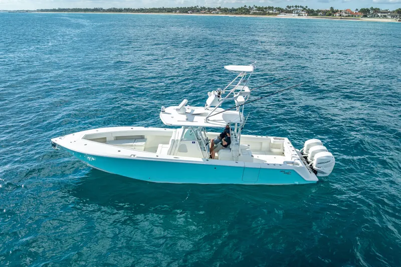  Yacht Photos Pics 2017 SeaVee 370Z boat on open ocean, featuring dual outboard engines.