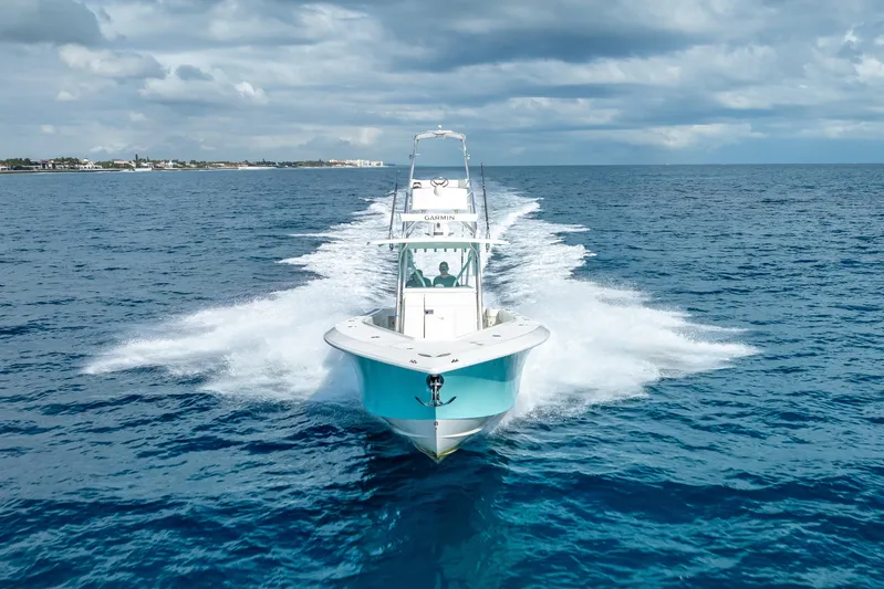  Yacht Photos Pics 2017 SeaVee 370Z boat cruising on open ocean under cloudy sky.