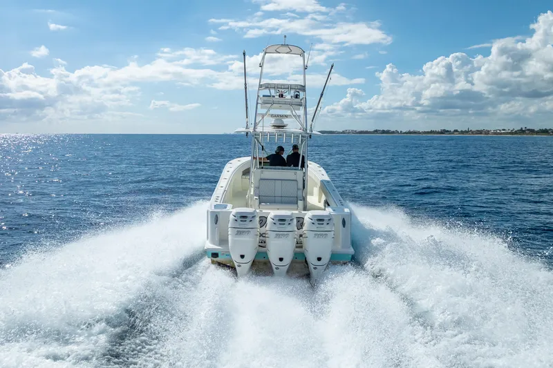  Yacht Photos Pics 2017 SeaVee 370Z boat cruising on open ocean with powerful engines.