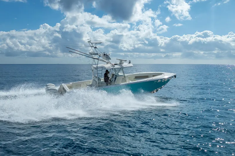  Yacht Photos Pics 2017 SeaVee 370Z boat cruising on open ocean under cloudy sky.
