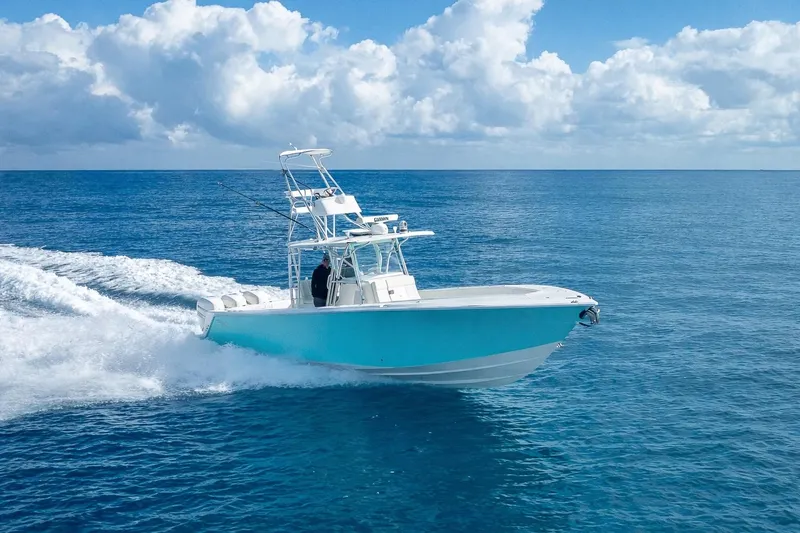  Yacht Photos Pics 2017 SeaVee 370Z boat cruising on open ocean under blue sky.