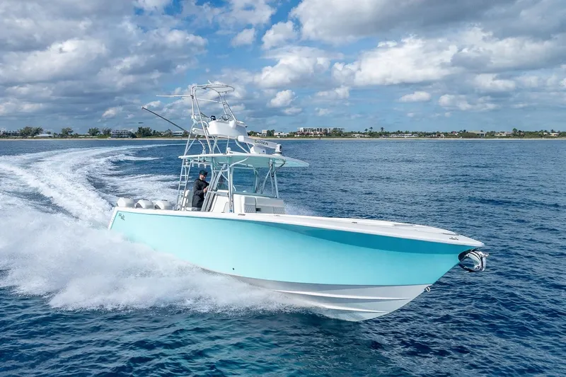  Yacht Photos Pics 2017 SeaVee 370Z boat cruising on open water under a partly cloudy sky.