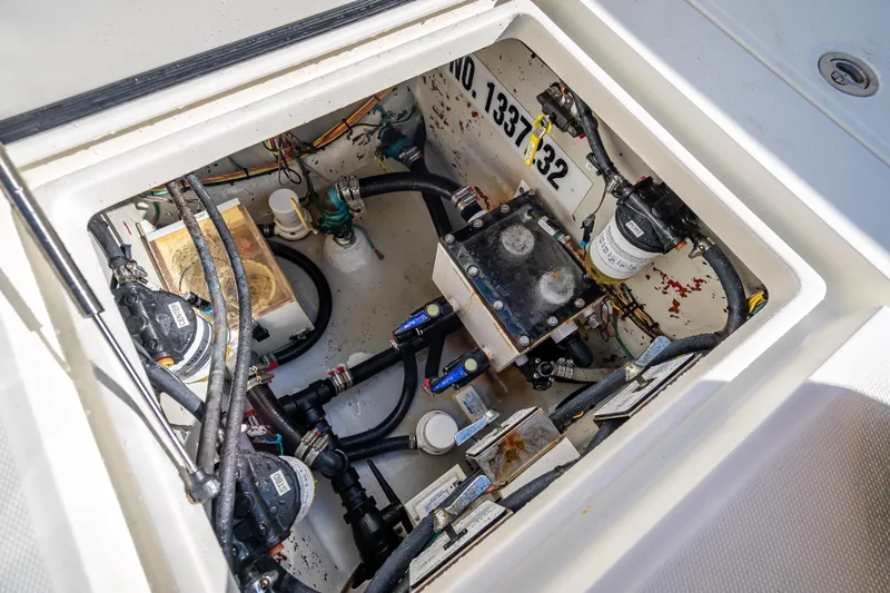  Yacht Photos Pics Engine compartment of 2017 SeaVee 370Z boat, showcasing mechanical components and wiring.