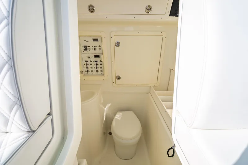  Yacht Photos Pics 2017 SeaVee 370Z boat interior with toilet and control panel.