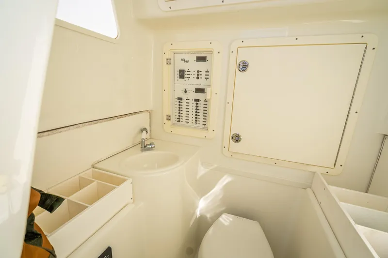  Yacht Photos Pics 2017 SeaVee 370Z boat interior with sink, control panel, and storage compartments.