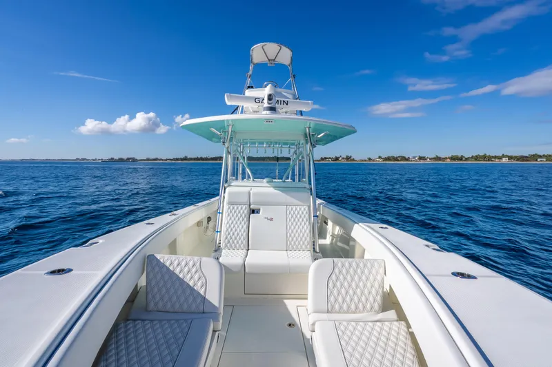  Yacht Photos Pics 2017 SeaVee 370Z boat on open water, featuring luxurious seating and clear blue skies.