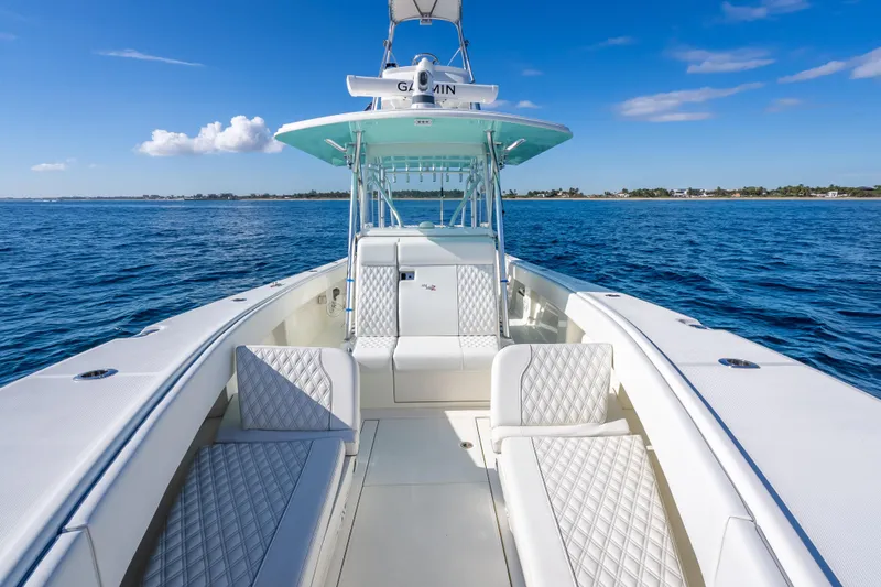  Yacht Photos Pics 2017 SeaVee 370Z boat on open water, featuring spacious seating and clear blue skies.