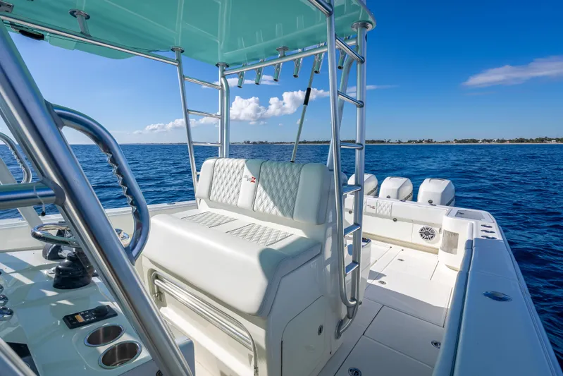  Yacht Photos Pics 2017 SeaVee 370Z boat interior with seating, ocean view, and clear blue sky.