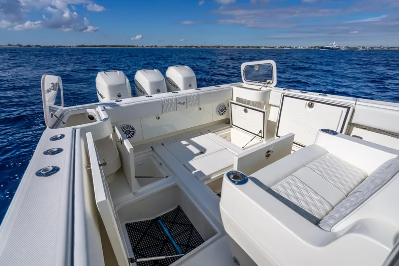  Yacht Photos Pics 2017 SeaVee 370Z boat interior with seating and storage, on open water.