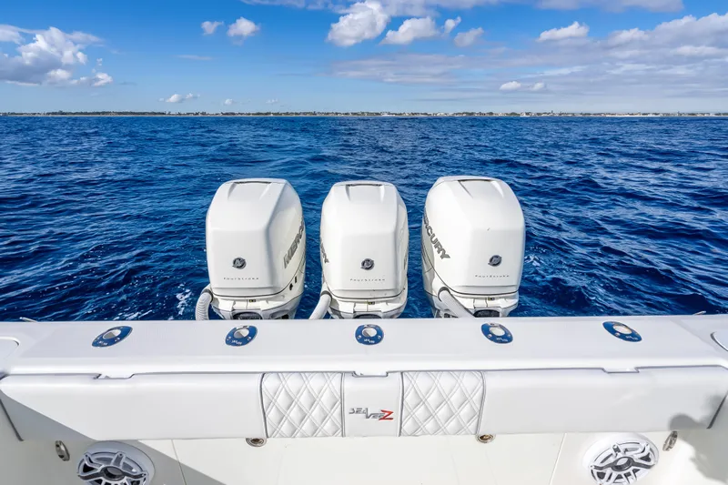  Yacht Photos Pics 2017 SeaVee 370Z boat with triple Mercury outboard engines on open ocean.