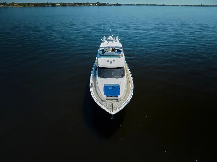  Yacht Photos Pics 2003 McKinna 58 Pilothouse yacht cruising on calm waters.
