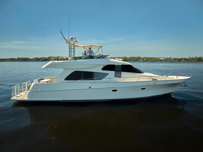  Yacht Photos Pics 2003 McKinna 58 Pilothouse yacht cruising on calm waters.