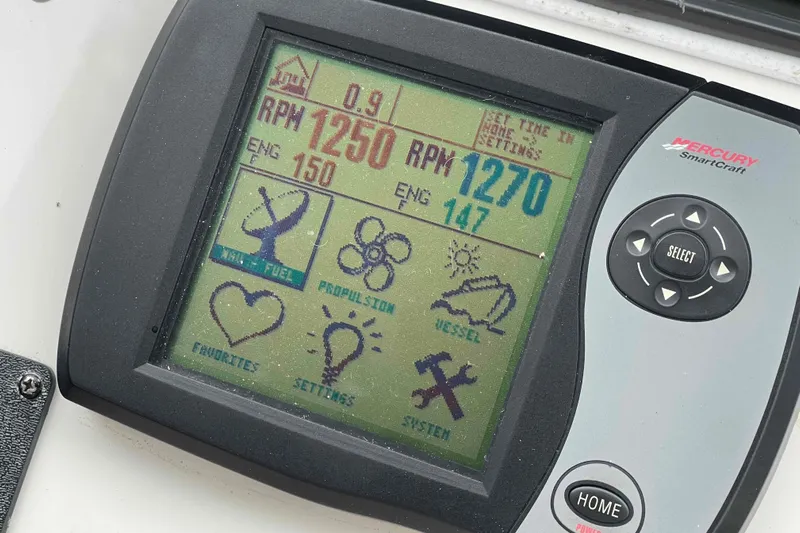 Beira Mar Yacht Photos Pics Mercury SmartCraft display on 2005 Sea Ray 420 Sedan Bridge showing engine data and settings.