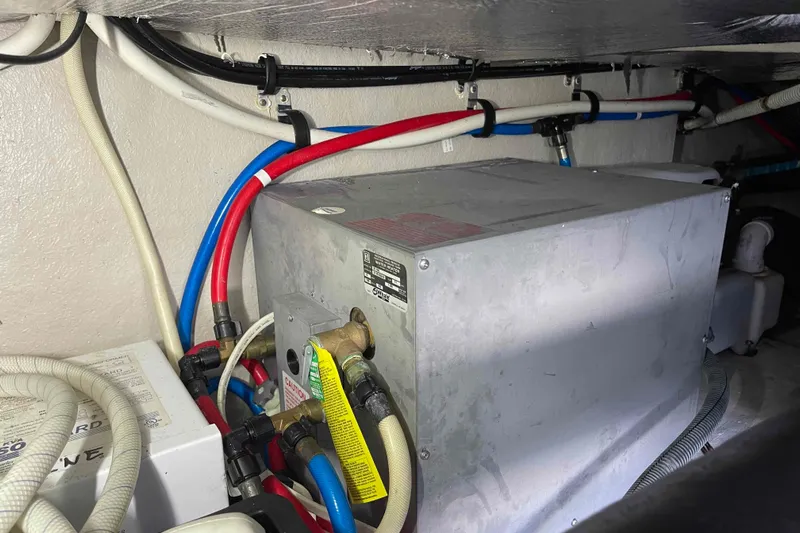 Beira Mar Yacht Photos Pics Engine room of 2005 Sea Ray 420 Sedan Bridge with visible wiring and equipment.