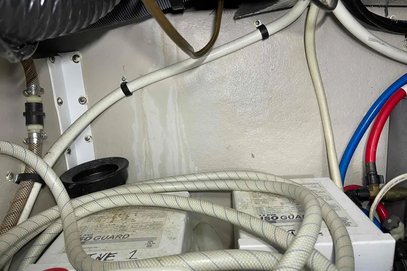 Beira Mar Yacht Photos Pics Engine room wiring and hoses in a 2005 Sea Ray 420 Sedan Bridge yacht.