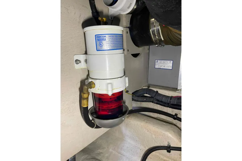 Beira Mar Yacht Photos Pics Diesel fuel filter in 2005 Sea Ray 420 Sedan Bridge engine compartment.