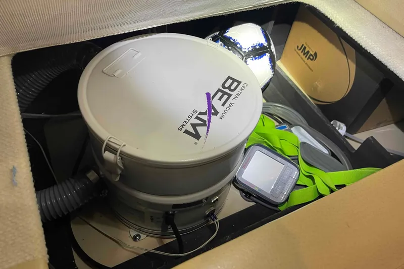 Beira Mar Yacht Photos Pics Storage compartment in a 2005 Sea Ray 420 Sedan Bridge with central vacuum system.