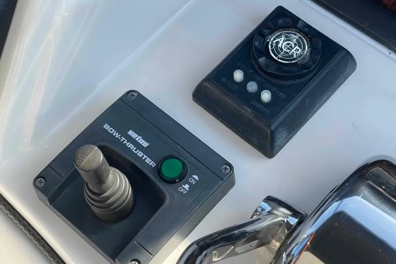 Beira Mar Yacht Photos Pics Control panel of a 2005 Sea Ray 420 Sedan Bridge, featuring bow thruster and navigation controls.