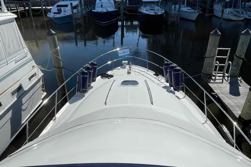 Beira Mar Yacht Photos Pics 2005 Sea Ray 420 Sedan Bridge yacht docked at marina, view from bow.