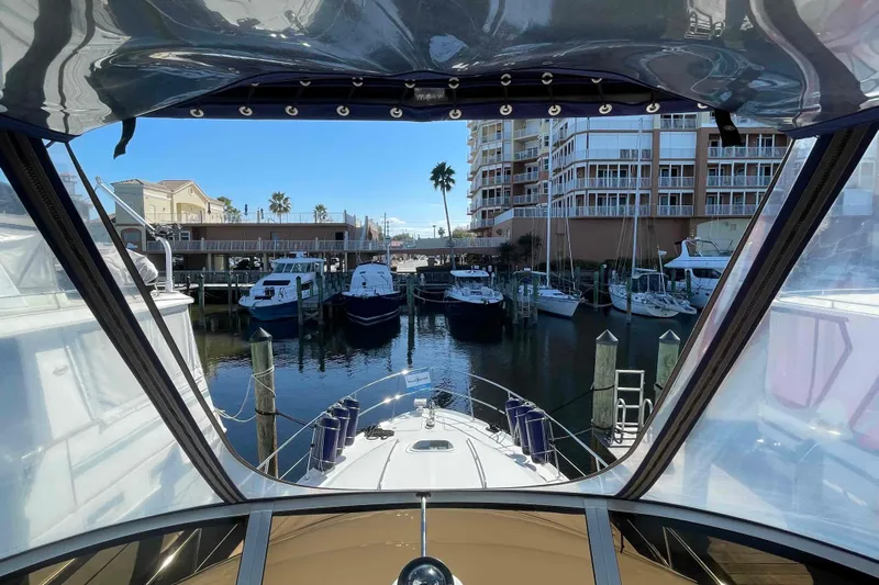 Beira Mar Yacht Photos Pics View from 2005 Sea Ray 420 Sedan Bridge, overlooking marina with boats and buildings.