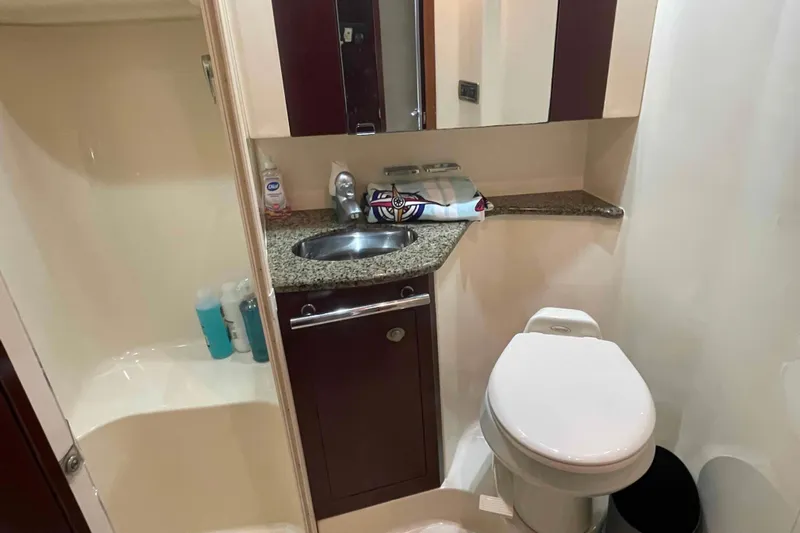 Beira Mar Yacht Photos Pics Luxurious bathroom in 2005 Sea Ray 420 Sedan Bridge yacht with granite countertop.