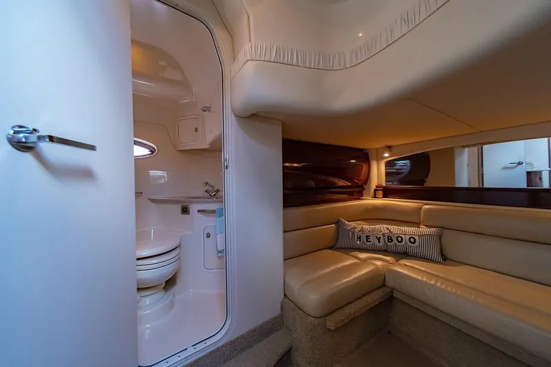 Le French Kiss Yacht Photos Pics Interior of 2008 Sea Ray 440 Sundancer yacht with cozy seating and bathroom.