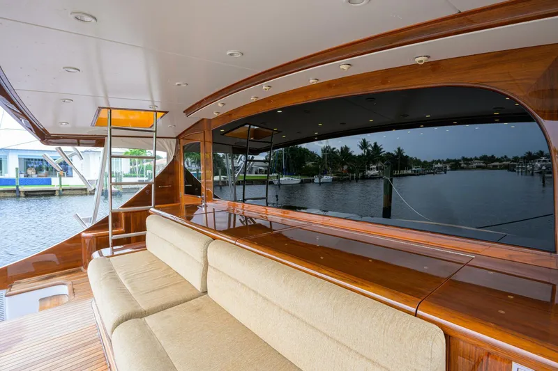 Pescaria Yacht Photos Pics 2009 Rybovich Custom Convertible yacht with elegant wooden interior and waterfront view.