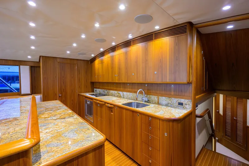 Pescaria Yacht Photos Pics Luxurious wooden interior of 2009 Rybovich Custom Convertible yacht kitchen.