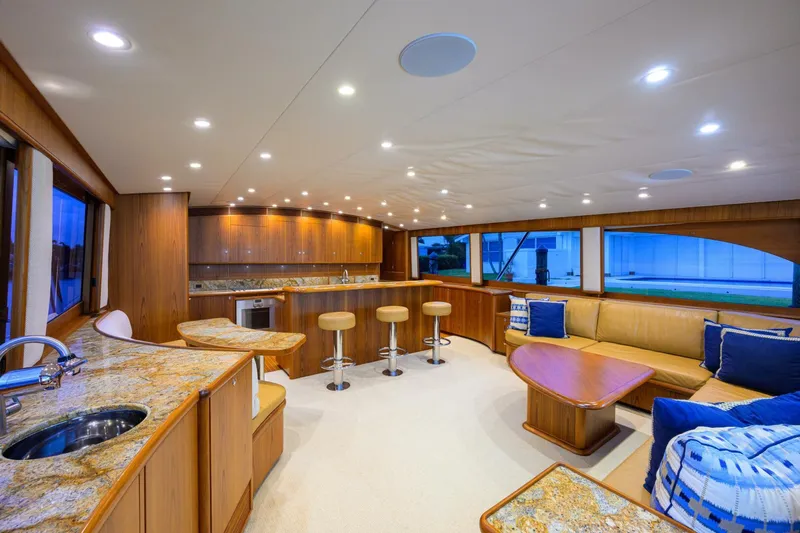 Pescaria Yacht Photos Pics Luxurious interior of 2009 Rybovich Custom Convertible yacht with elegant seating and modern amenities.