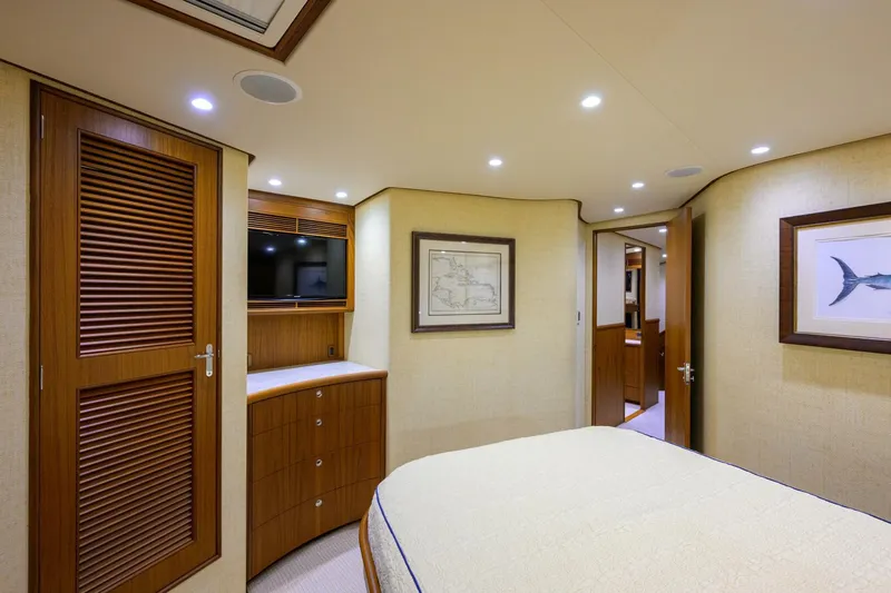 Pescaria Yacht Photos Pics Luxurious cabin interior of 2009 Rybovich Custom Convertible yacht with wood accents and modern amenities.