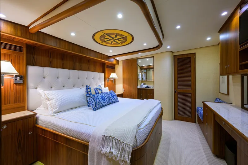 Pescaria Yacht Photos Pics Luxurious cabin interior of 2009 Rybovich Custom Convertible yacht with elegant wood finishes.