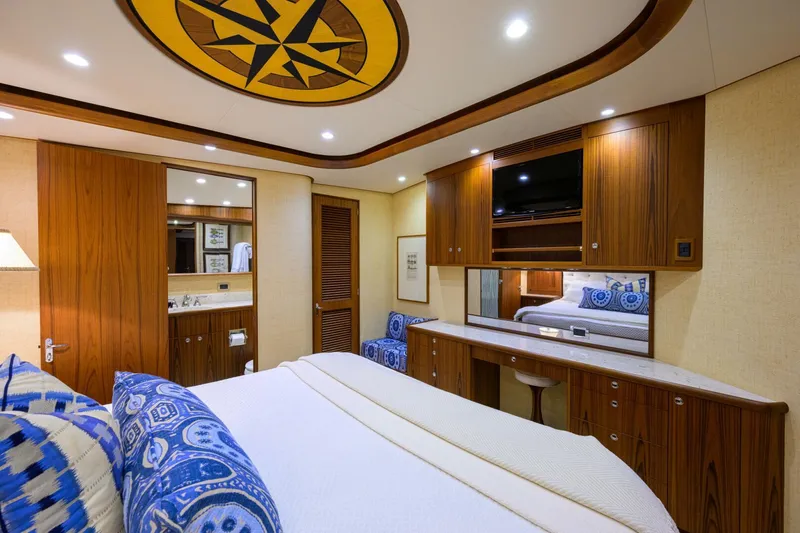 Pescaria Yacht Photos Pics Luxurious cabin interior of 2009 Rybovich Custom Convertible yacht with elegant wood finishes.