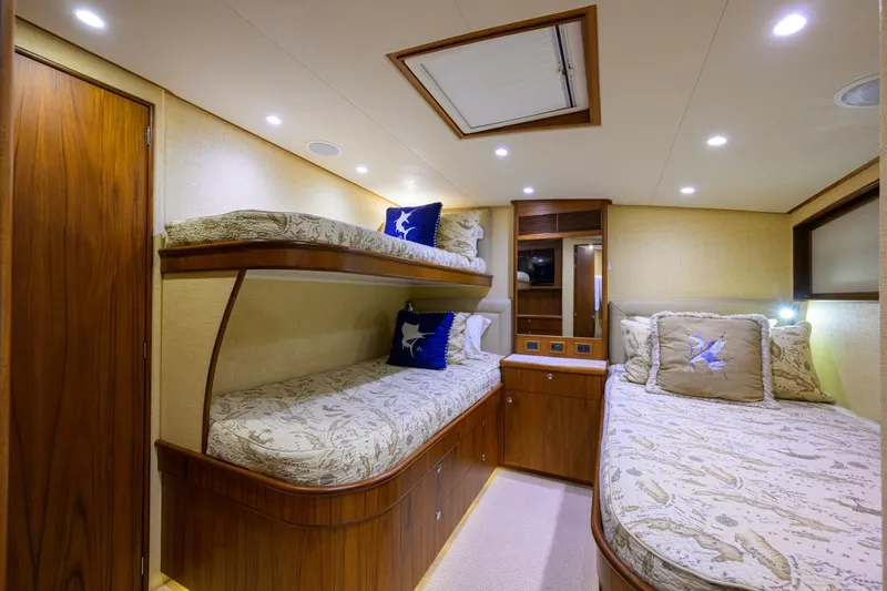 Pescaria Yacht Photos Pics 2009 Rybovich Custom Convertible yacht cabin with bunk beds and elegant wood finish.